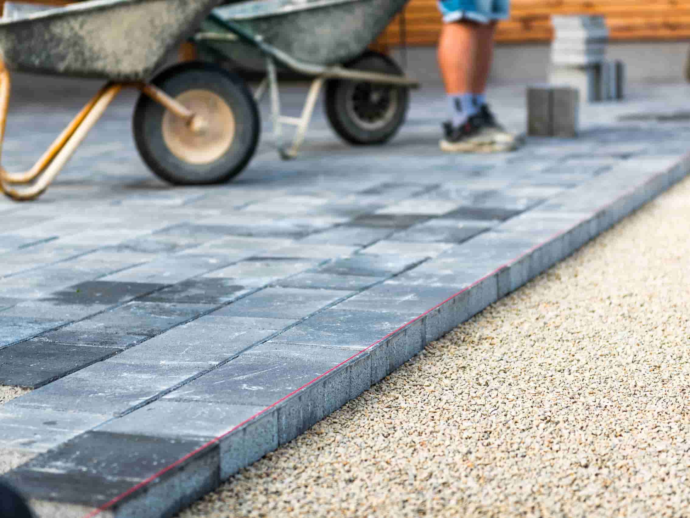 This is a grey brick driveway being installed